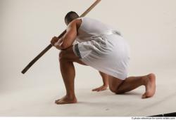 ATILLA KNEELING POSE WITH SPEAR